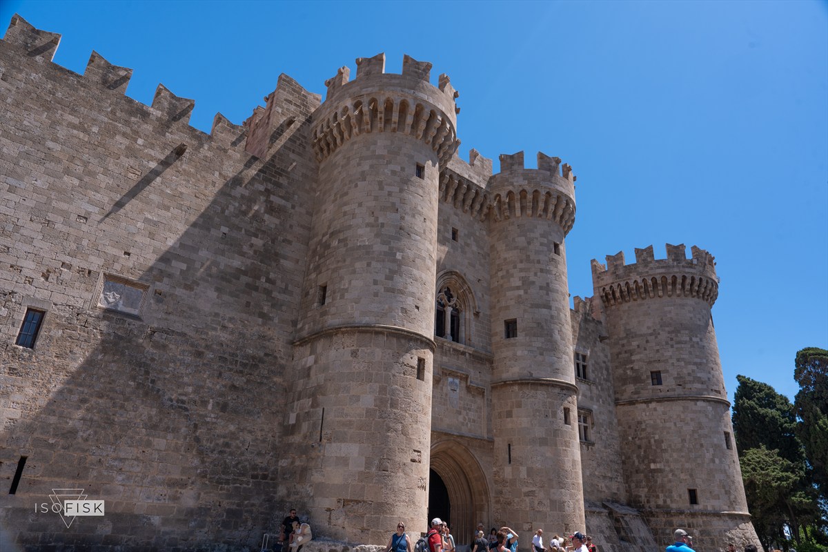 Stone fortress walls and three round towers