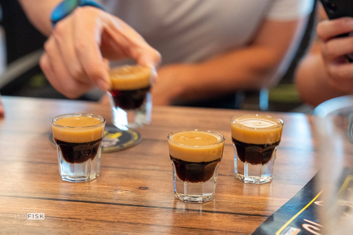 Three small coffees on a wooden table